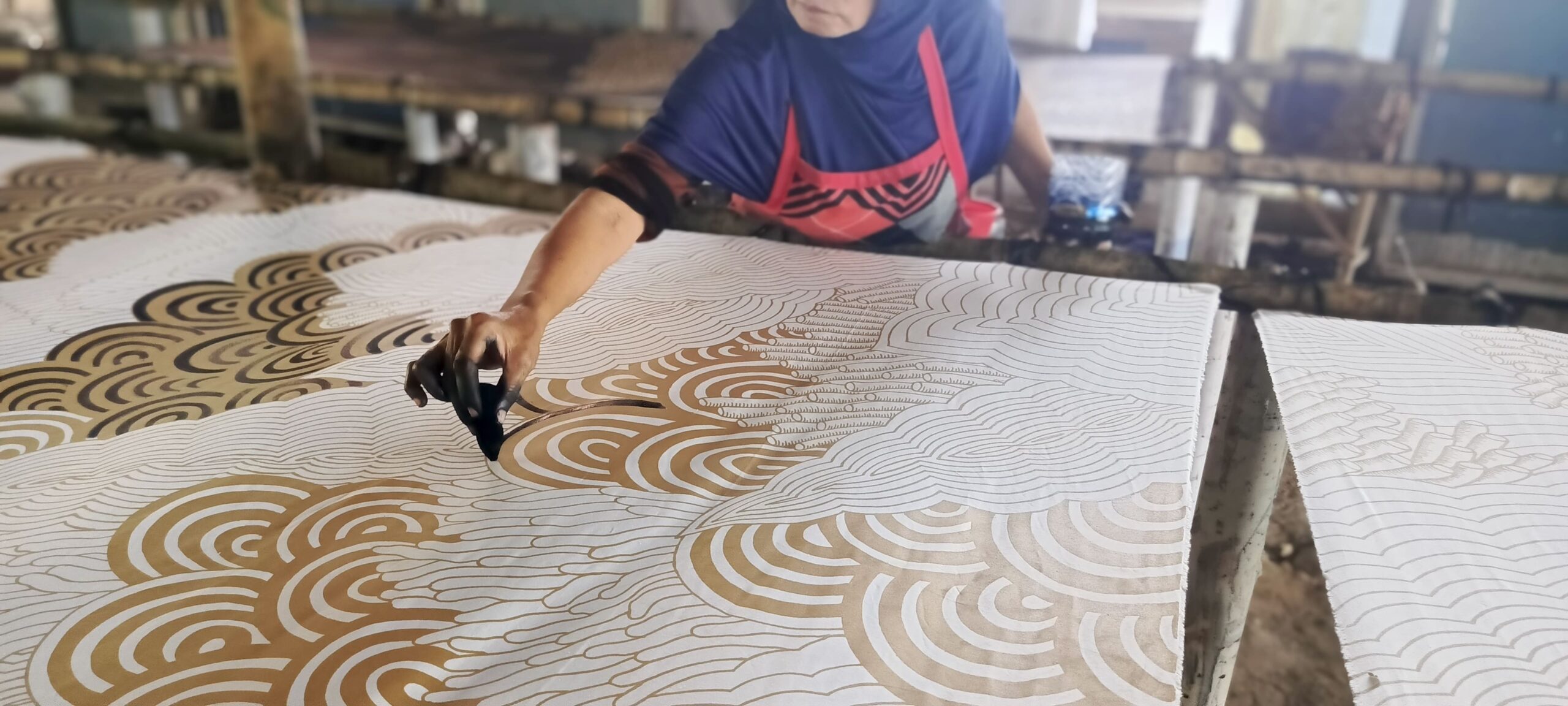 Kain Batik Berlogo